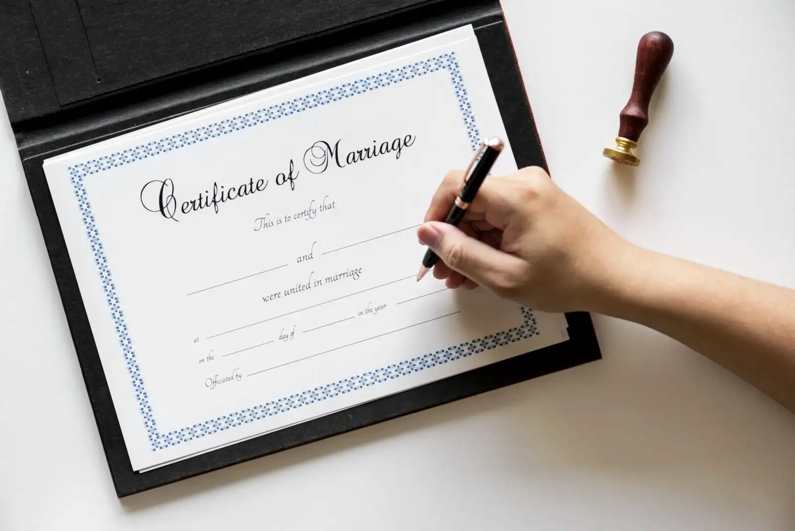 Hand signing on marriage certification